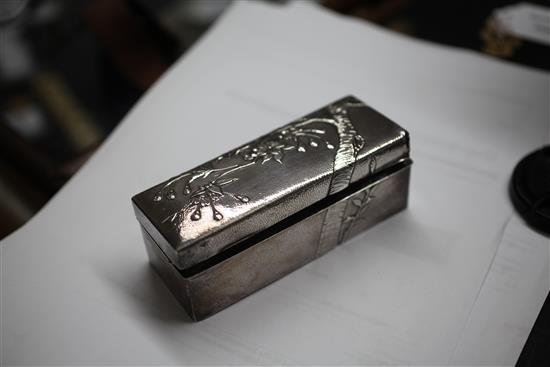 Three early 20th century Japanese textured silver toilet boxes, two signed Miyamoto Shoko, largest 6in.